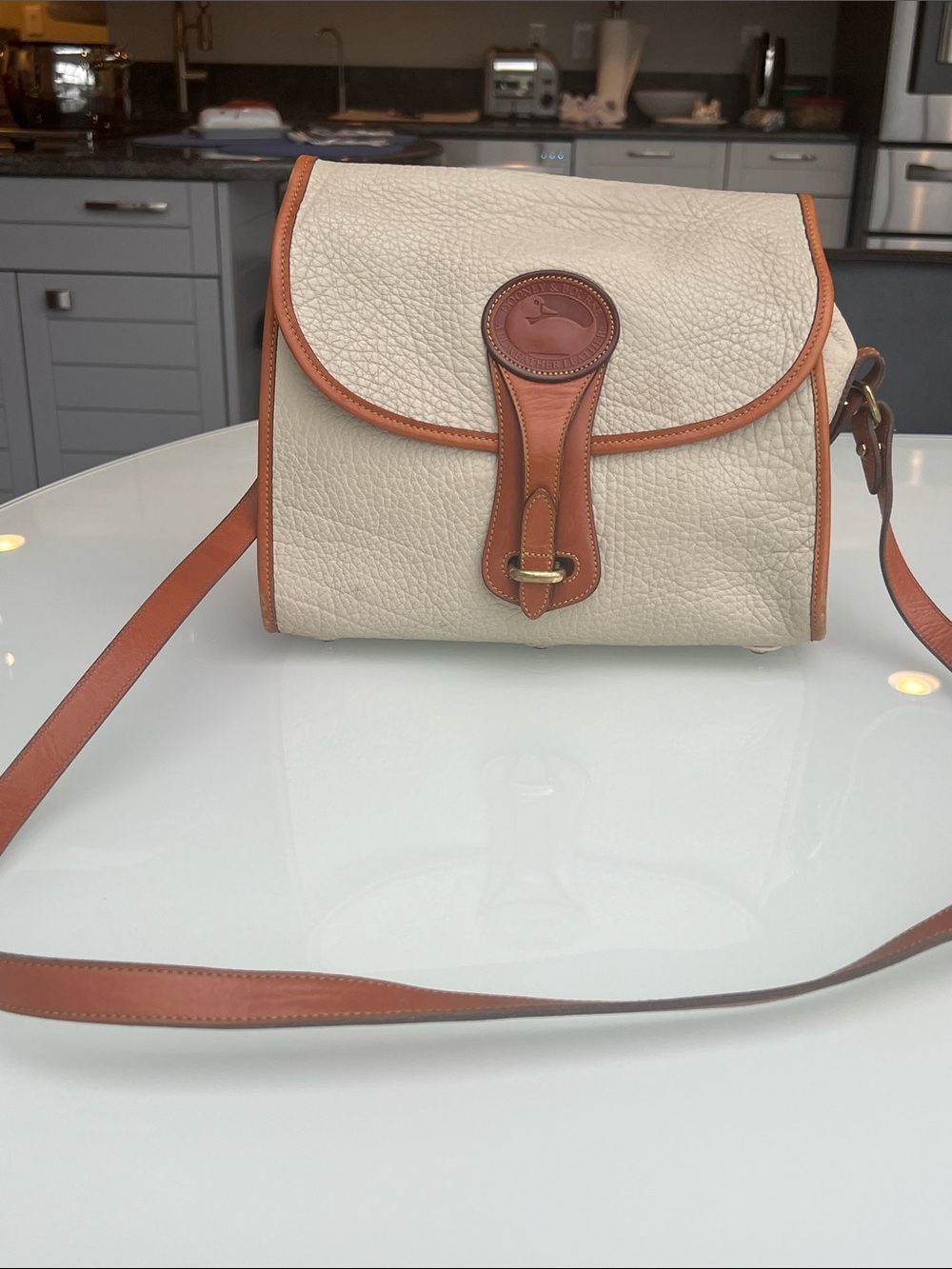 Vintage Dooney & Bourke Cream Pebbled Leather Crossbody with Tan Trim and Strap